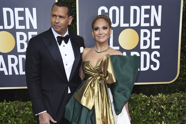 Alex Rodriguez, left, and Jennifer Lopez arrive at the 77th annual Golden Globe Awards at the Beverly Hilton Hotel on Sunday, Jan. 5, 2020, in Beverly Hills, Calif. (Photo by Jordan Strauss/Invision/AP)