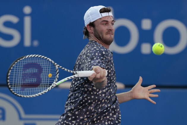 Tommy Paul of the U.S. returns a ball in his quarterfinal match against John Isner of the U.S. at the Mexican Tennis Open in Acapulco, Mexico, Thursday, Feb. 27, 2020.(AP Photo/Rebecca Blackwell)