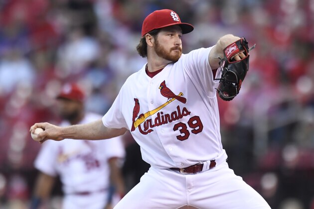FILE - In this May 4, 2018, file photo, St. Louis Cardinals starting pitcher Miles Mikolas (39) throws in the first inning during a baseball game against the Chicago Cubs, in St. Louis. Mikolas returned from a three-year stay in Japan when he signed with the Cardinals during the offseason. The right-hander has been one of the top starters for the Cardinals in his return, walking only two batters in 40 innings this season. (AP Photo/Michael Thomas, File)