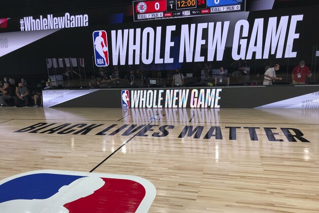 A basketball court is shown at the ESPN Wide World of Sports complex in Kissimmee, Fla., Tuesday, July 21, 2020. The NBA's marketing motto for the restart of the season at Walt Disney World is “Whole New Game,” and in many respects, that’s very true. (AP Photo/Tim Reynolds)