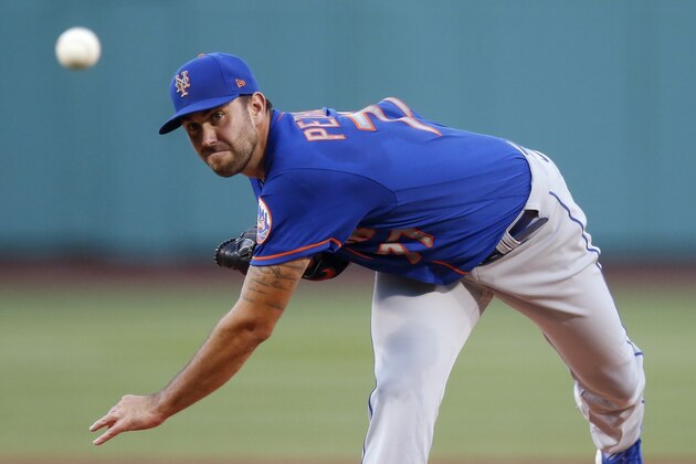 New York Mets' David Peterson pitches during the first inning of a baseball game against the Boston Red Sox, Tuesday, July 28, 2020, in Boston. (AP Photo/Michael Dwyer)
