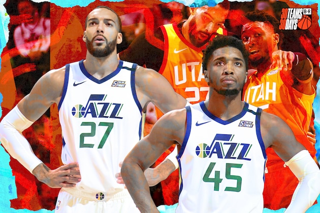 Utah Jazz's Donovan Mitchell (45) and Rudy Gobert talk during a time out in the second half during an NBA basketball game against the Houston Rockets on Saturday, Feb. 22, 2020, in Salt Lake City. The Houston Rockets defeated the Utah Jazz 120-110. (AP Photo/Kim Raff)