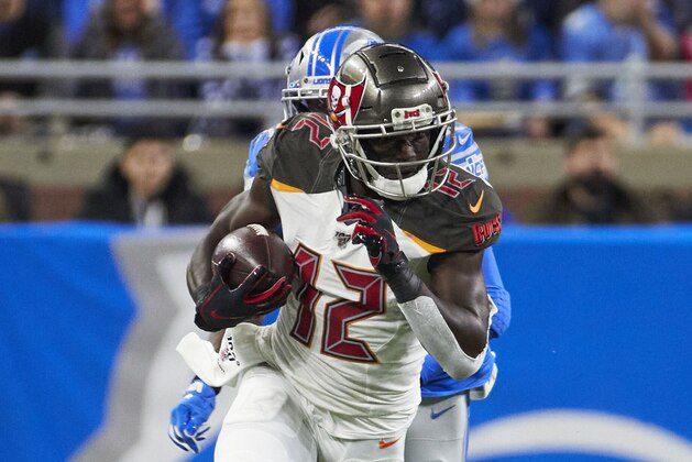 Tampa Bay Buccaneers wide receiver Chris Godwin (12) runs the ball after he makes a reception against the Detroit Lions during an NFL football game in Detroit, Sunday, Dec. 15, 2019. (AP Images/Rick Osentoski)