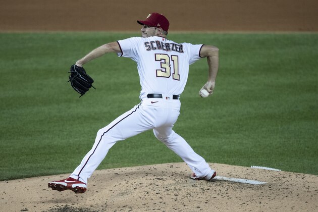 Washington Nationals starting pitcher Max Scherzer throws during the fifth inning of an opening day baseball game against the New York Yankees at Nationals Park, Thursday, July 23, 2020, in Washington. (AP Photo/Alex Brandon)