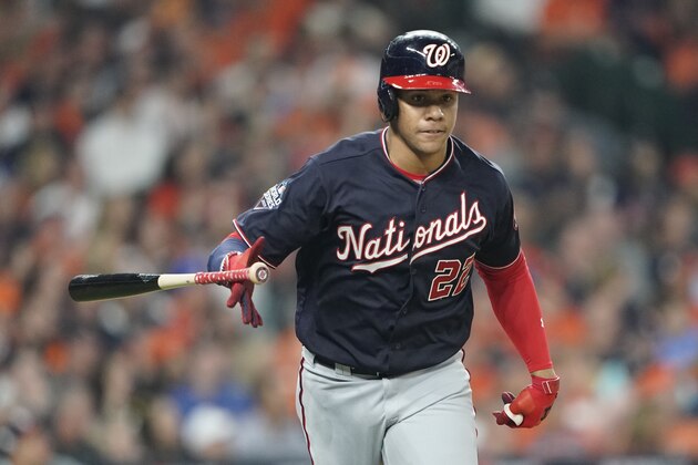 Washington Nationals' Juan Soto hits a home run during the fourth inning of Game 1 of the baseball World Series against the Houston Astros Tuesday, Oct. 22, 2019, in Houston. (AP Photo/David J. Phillip)