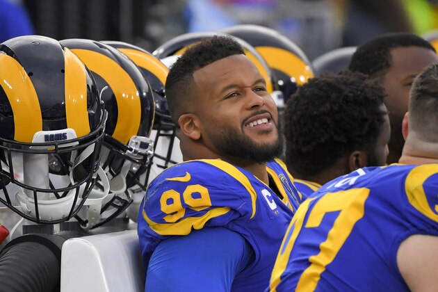 Los Angeles Rams defensive tackle Aaron Donald sits on the bench during second half of an NFL football game against the Arizona Cardinals Sunday, Dec. 29, 2019, in Los Angeles. (AP Photo/Mark J. Terrill)