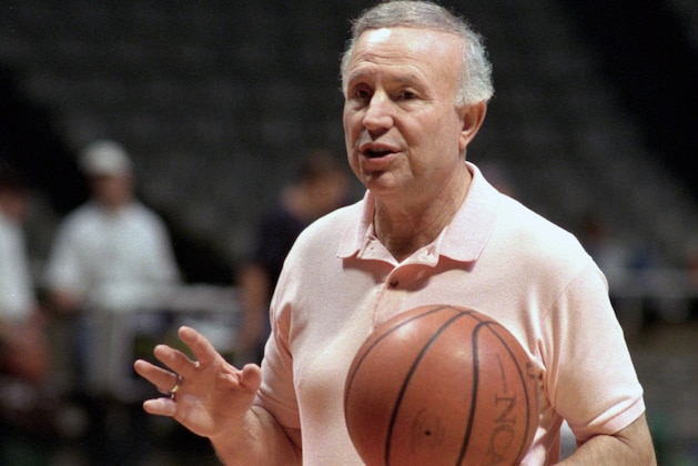 FILE - In this Oct. 17, 1995 file photo, Illinois men's basketball coach Lou Henson gives directions to his team during practice after the team's media day in Champaign, Ill. The team started practice this week at the Assembly Hall in Champaign, Ill. On Tuesday, Feb. 17, 2015, Henson learned he was headed for the College Basketball Hall of Fame.(AP Photo/Mark Cowan, File)