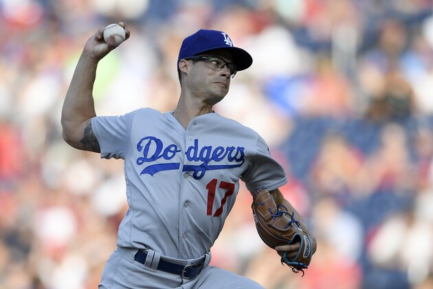 Los Angeles Dodgers relief pitcher Joe Kelly delivers a pitch during a baseball game against the Washington Nationals, Saturday, July 27, 2019, in Washington. The Dodgers won 9-3. (AP Photo/Nick Wass)