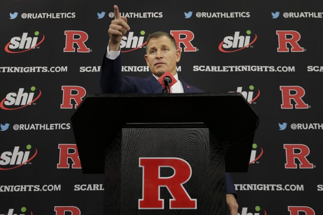 FILE - In this Dec. 4, 2019 photo, new Rutgers football coach Greg Schiano speaks at an introductory news conference in Piscataway, N.J. After an on-again, off-again courtship, Greg Schiano is back as Rutgers football coach.  Schiano's hiring was one of the top news stories in New Jersey in 2019. (AP Photo/Seth Wenig, File)