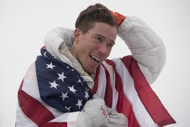 Shaun White, of the United States, celebrates his gold medal win in snowboard halfpipe at the Pyeongchang 2018 Winter Olympic Games in South Korea, Wednesday, Feb. 14, 2018. (Jonathan Hayward/The Canadian Press via AP)