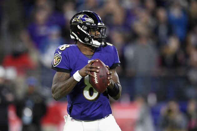 Baltimore Ravens quarterback Lamar Jackson (8) looks to pass during the first half an NFL divisional playoff football game against the Tennessee Titans, Saturday, Jan. 11, 2020, in Baltimore. (AP Photo/Nick Wass)