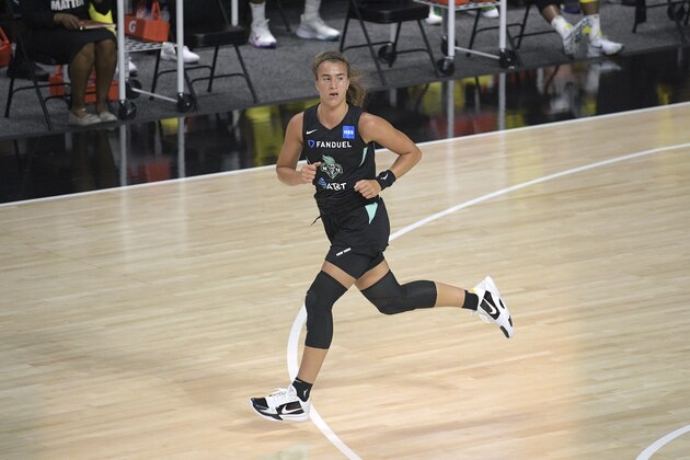 New York Liberty guard Sabrina Ionescu runs up the court after making a basket during the first half of a WNBA basketball game against the Seattle Storm, Saturday, July 25, 2020, in Bradenton, Fla. (AP Photo/Phelan M. Ebenhack)