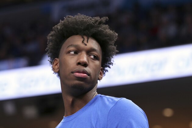 Memphis' James Wiseman watches from the bench during the first half of the team's NCAA college basketball game against Little Rock on Wednesday, Nov. 20, 2019, in Memphis, Tenn. (AP Photo/Karen Pulfer Focht) Memphis' James Wiseman watches from the bench during the first half of the team's NCAA college basketball game against Little Rock on Wednesday, Nov. 20, 2019, in Memphis, Tenn. (AP Photo/Karen Pulfer Focht)