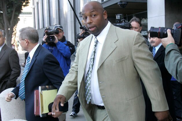 FILE - In this Jan. 18, 2008, file photo, former NFL football player Dana Stubblefield leaves a federal courthouse in San Francisco. Stubblefield was convicted Monday, July 27, 2020, of the rape of a developmentally disabled woman after, prosecutors said, he lured the victim to his home with the promise of a babysitting job. A jury found Stubblefield, 49, guilty of rape by force, oral copulation by force and false imprisonment, and acquitted him of raping a person incapable of giving consent, the San Francisco Chronicle reported. Jurors also found that Stubblefield used a gun during the assault, prosecutors said. (AP Photo/Jeff Chiu, File)