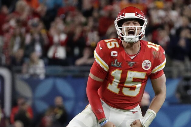 Kansas City Chiefs quarterback Patrick Mahomes (15) celebrates a long pass against the San Francisco 49ers during the second half of the NFL Super Bowl 54 football game Sunday, Feb. 2, 2020, in Miami Gardens, Fla. (AP Photo/Wilfredo Lee)
