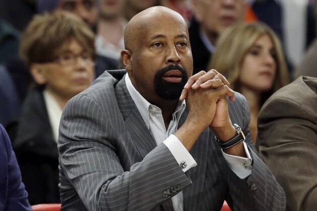 New York Knicks head coach Mike Woodson watches his team play during the first half of an NBA basketball game against the Toronto Raptors Wednesday, April 16, 2014, in New York. (AP Photo/Frank Franklin II)