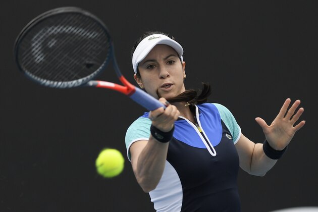 United States' Christina McHale hits a forehand return to Croatia's Petra Martic during their first round singles match the Australian Open tennis championship in Melbourne, Australia, Monday, Jan. 20, 2020. (AP Photo/Andy Brownbill)