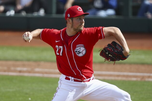 Cincinnati Reds pitcher Trevor Bauer throws against the Los Angeles Dodgers during the fourth inning of a spring training baseball game Monday, March 2, 2020, in Goodyear, Ariz. (AP Photo/Ross D. Franklin)