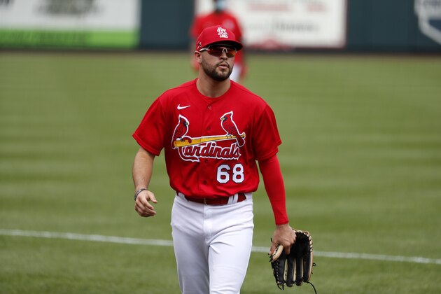 St. Louis Cardinals outfielder Dylan Carlson walks off the field during baseball practice at Busch Stadium Friday, July 3, 2020, in St. Louis. (AP Photo/Jeff Roberson)