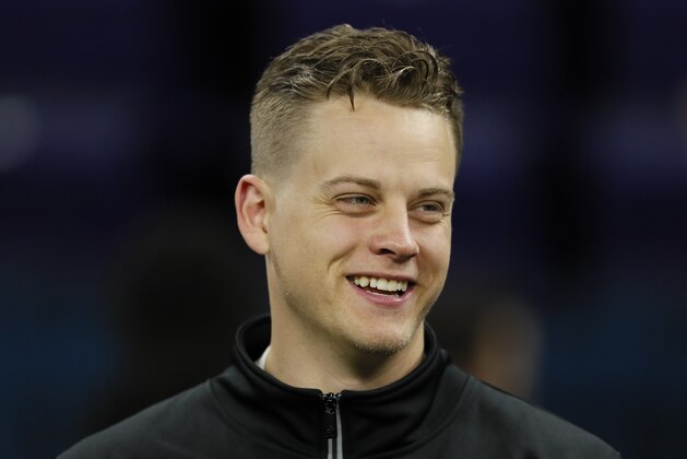 LSU quarterback Joe Burrow watches a drill at the NFL football scouting combine in Indianapolis, Thursday, Feb. 27, 2020. (AP Photo/Charlie Neibergall)