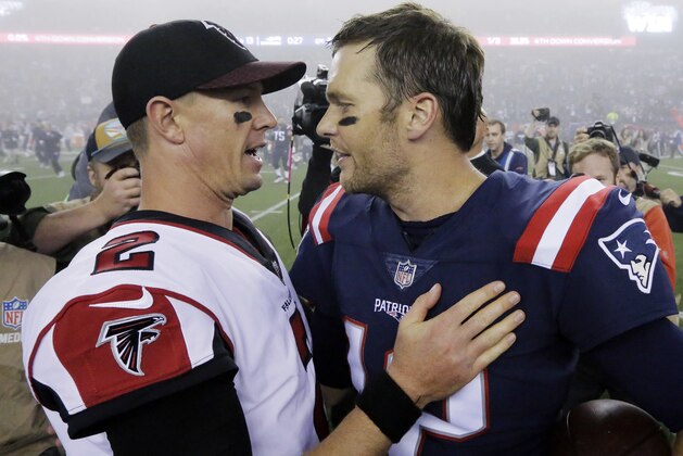 Atlanta Falcons quarterback Matt Ryan, left, and New England Patriots quarterback Tom Brady, right, speak at midfield after an NFL football game, Sunday, Oct. 22, 2017, in Foxborough, Mass. (AP Photo/Steven Senne)
