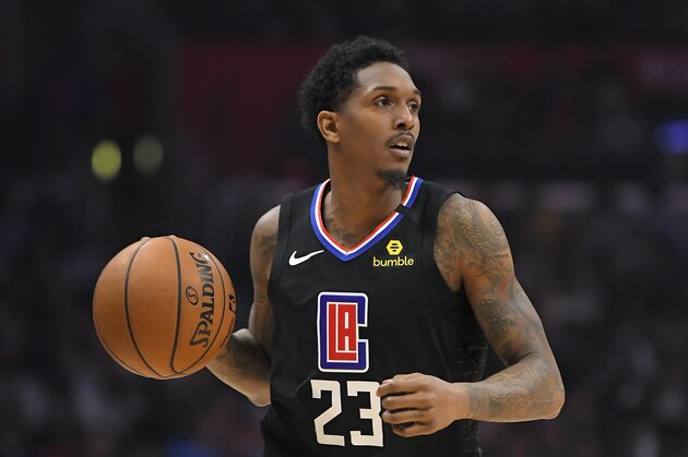 Los Angeles Clippers guard Lou Williams dribbles during the second half of an NBA basketball game against the Denver Nuggets Friday, Feb. 28, 2020, in Los Angeles. The Clippers won 132-103. (AP Photo/Mark J. Terrill)