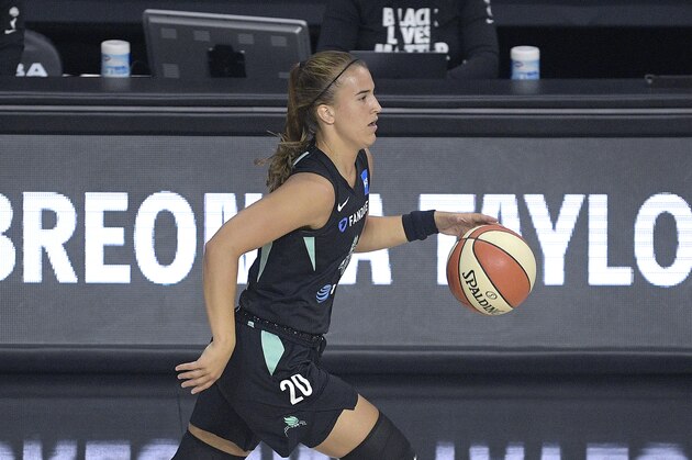 New York Liberty guard Sabrina Ionescu (20) brings the ball up the court during the first half of a WNBA basketball game against the Seattle Storm, Saturday, July 25, 2020, in Bradenton, Fla. (AP Photo/Phelan M. Ebenhack)