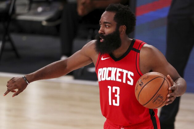 Houston Rockets James Harden (13) dribbles the ball against the Dallas Mavericks during the second half of an NBA basketball game Friday, July 31, 2020, in Lake Buena Vista, Fla. (Mike Ehrmann/Pool Photo via AP) Houston Rockets James Harden (13) dribbles the ball against the Dallas Mavericks during the second half of an NBA basketball game Friday, July 31, 2020, in Lake Buena Vista, Fla. (Mike Ehrmann/Pool Photo via AP)