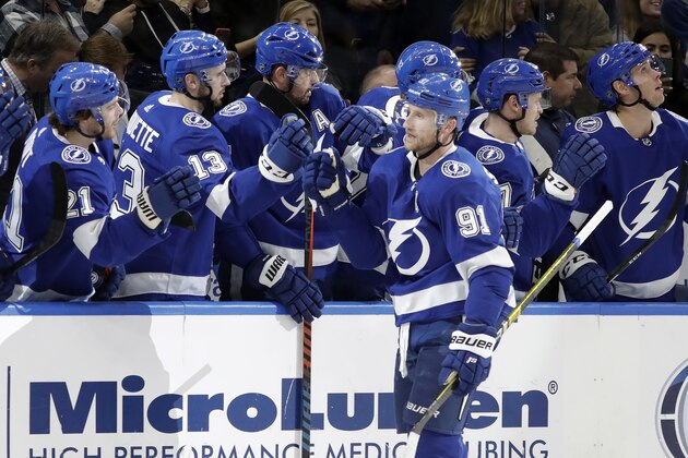 Tampa Bay Lightning center Steven Stamkos (91) celebrates with the bench after his goal against the Los Angeles Kings during the first period of an NHL hockey game Tuesday, Jan. 14, 2020, in Tampa, Fla. (AP Photo/Chris O'Meara)