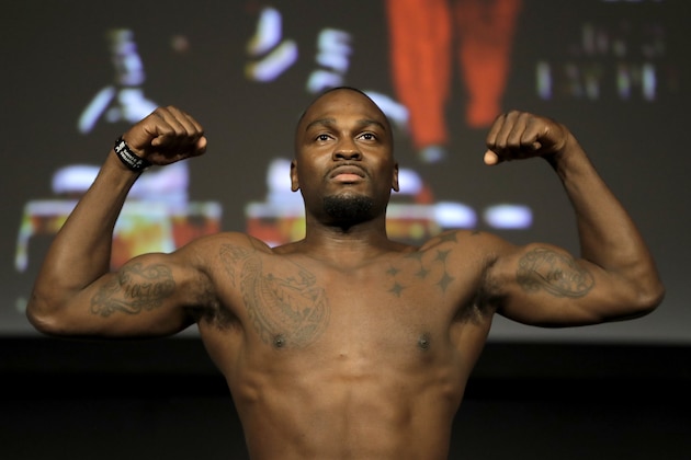 Derek Brunson stands atop a scale during weigh-ins ahead of his mixed martial arts middleweight bout against Israel Adesanya at UFC 230, Friday, Nov. 2, 2018, at Madison Square Garden in New York. (AP Photo/Julio Cortez)