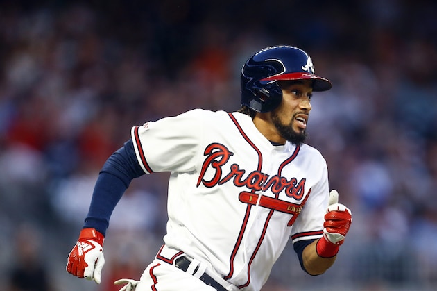 Atlanta Braves center fielder Billy Hamilton (9) runs to first on a double during the first inning of a baseball game against the Chicago White Sox, Saturday, Aug. 31, 2019, in Atlanta, Ala. (AP Photo/Butch Dill)