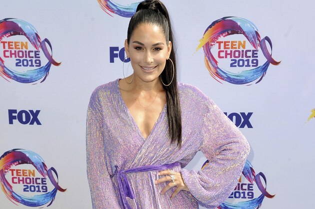 Brie Bella arrives at the Teen Choice Awards on Sunday, Aug. 11, 2019, in Hermosa Beach, Calif. (Photo by Richard Shotwell/Invision/AP)