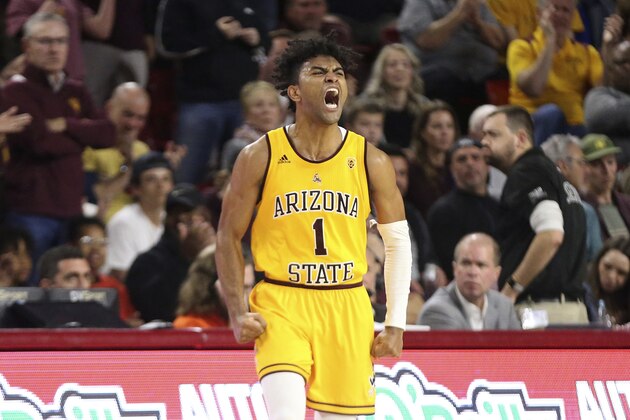 FILE - In this Feb. 22, 2020, file photo, Arizona State's Remy Martin (1) shows his feelings after a run by his Sun Devils against Oregon State during the second half of an NCAA college basketball game in Tempe, Ariz. Martin was selected to the Associated Press All Pac-12 team selected Tuesday, March 10, 2020. (AP Photo/Darryl Webb, File)