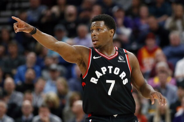 FILE - In this March 9, 2020, file photo, Toronto Raptors guard Kyle Lowry (7) directs his team during the first half during an NBA basketball game against the Utah Jazz in Salt Lake City. The defending NBA champions enter the NBA restart sitting second in the Eastern Conference. (AP Photo/Rick Bowmer, File)