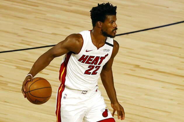 Miami Heat's Jimmy Butler dribbles up court during the first half of an NBA basketball game against the Denver Nuggets, Saturday, Aug. 1, 2020, in Lake Buena Vista, Fla. (Kevin C. Cox/Pool Photo via AP) Miami Heat's Jimmy Butler dribbles up court during the first half of an NBA basketball game against the Denver Nuggets, Saturday, Aug. 1, 2020, in Lake Buena Vista, Fla. (Kevin C. Cox/Pool Photo via AP)