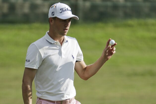 Justin Thomas waves on the 18th hole during the final round of the World Golf Championship-FedEx St. Jude Invitational Sunday, Aug. 2, 2020, in Memphis, Tenn. (AP Photo/Mark Humphrey)
