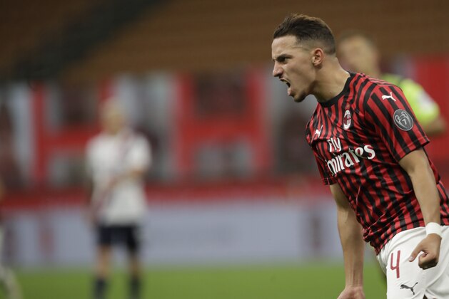 AC Milan's Ismael Bennacer celebrates after scoring during a Serie A soccer match between AC Milan and Bologna, at the San Siro stadium in Milan, Italy, Saturday, July 18, 2020. (AP Photo/Luca Bruno)