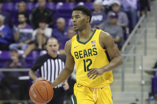 Baylor guard Jared Butler (12) brings the ball down court against TCU during an NCAA college basketball game on Saturday, Feb. 29, 2020 in Fort Worth, Texas. (AP Photo/Richard W. Rodriguez) Baylor guard Jared Butler (12) brings the ball down court against TCU during an NCAA college basketball game on Saturday, Feb. 29, 2020 in Fort Worth, Texas. (AP Photo/Richard W. Rodriguez)