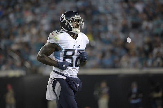 Tennessee Titans tight end Delanie Walker (82) sets up for a play during the second half of an NFL football game against the Jacksonville Jaguars Thursday, Sept. 19, 2019, in Jacksonville, Fla. (AP Photo/Phelan M. Ebenhack)