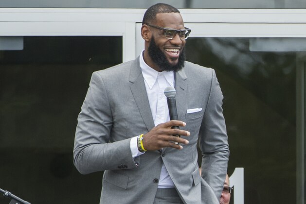 LeBron James speaks at the opening ceremony for the I Promise School in Akron, Ohio, Monday, July 30, 2018. The I Promise School is supported by the The LeBron James Family Foundation and is run by the Akron Public Schools. (AP Photo/Phil Long)