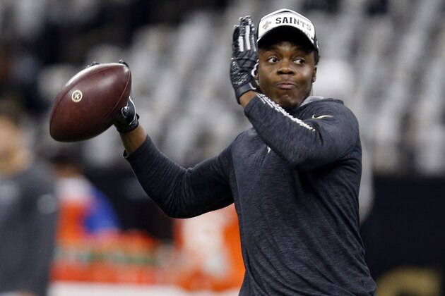 FILE - In this Nov. 24, 2019, file photo, New Orleans Saints quarterback Teddy Bridgewater warms up before an NFL football game against the Carolina Panthers in New Orleans. Not surprisingly some of the biggest focus is at quarterback with Teddy Bridgewater tasked with replacing Newton in Carolina after the former No. 1 pick had a nine-year run as starter for the Panthers. (AP Photo/Butch Dill, File)