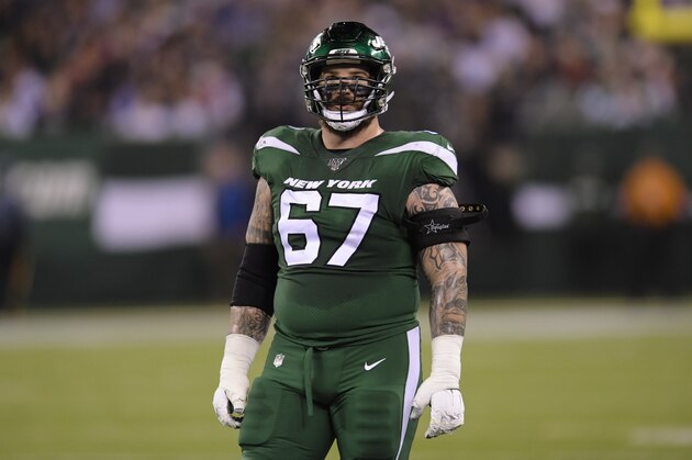 New York Jets offensive guard Brian Winters (67) during the first half of an NFL football game against the New England Patriots Monday, Oct. 21, 2019, in East Rutherford, N.J. (AP Photo/Bill Kostroun)