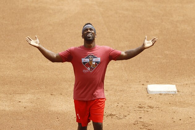 Philadelphia Phillies' Andrew McCutchen reacts after running the bases during baseball practice at Citizens Bank Park, Tuesday, July 7, 2020, in Philadelphia. (AP Photo/Matt Slocum)