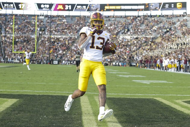 Minnesota wide receiver Rashod Bateman (13) run in for a touchdown after a catch against Purdue during the second half of an NCAA college football game in West Lafayette, Ind., Saturday, Sept. 28, 2019. Minnesota defeated Purdue 38-31. (AP Photo/Michael Conroy)