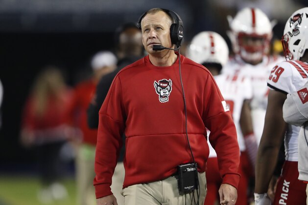 North Carolina State coach Dave Doeren paces on the sideline during the second half of the team's NCAA college football game against Georgia Tech on Thursday, Nov. 21, 2019, in Atlanta. Georgia Tech won 28-26. (AP Photo/John Bazemore)
