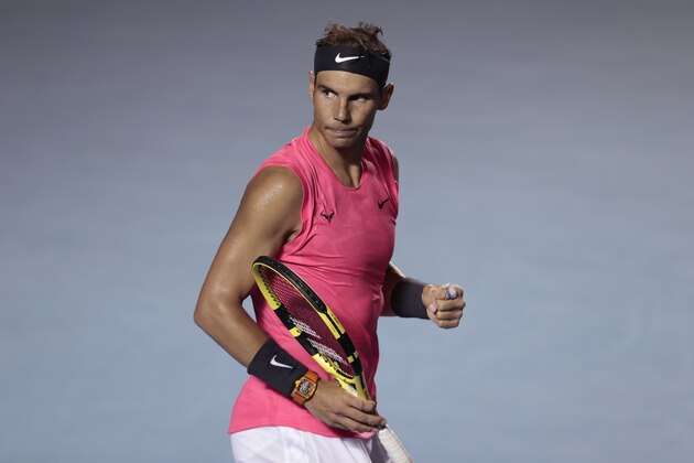 Spain's Rafael Nadal pumps his fist as he defeats Spain's Pablo Andujar in the opening round of the Mexican Open tennis tournament in Acapulco, Mexico, Tuesday, Feb. 25, 2020. (AP Photo/Rebecca Blackwell)
