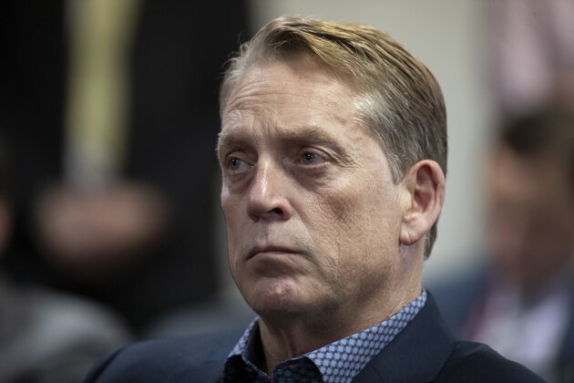 Washington Redskins defensive coordinator Jack Del Rio listens to head coach Ron Rivera during a news conference at the team's NFL football training facility, Thursday, Jan. 2, 2020 in Ashburn, Va. (AP Photo/Alex Brandon)