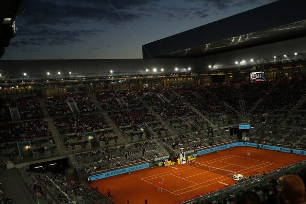 Karolina Pliskova, left, from Czech Republic returns a ball from Czech Republic's Petra Kvitova during a Madrid Open tennis tournament semifinal match in Madrid, Spain, Friday, May 11, 2018. Kvitova won 7-6, 6-3. (AP Photo/Francisco Seco)