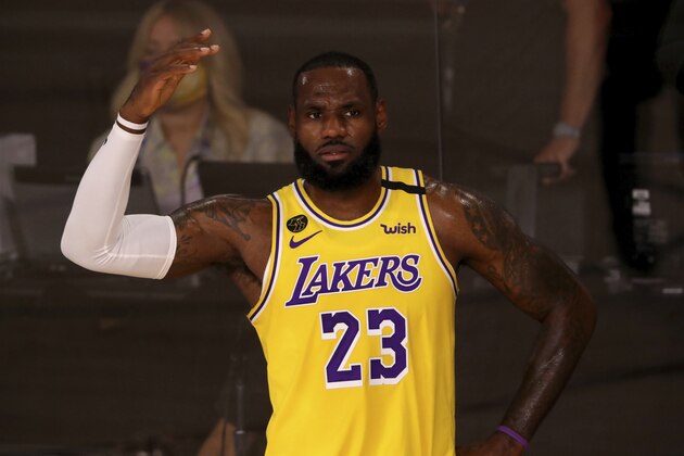 Los Angeles Lakers' LeBron James looks on during the first quarter of an NBA basketball game against the Los Angeles Clippers, Thursday, July 30, 2020, in Lake Buena Vista, Fla. (Mike Ehrmann/Pool Photo via AP)