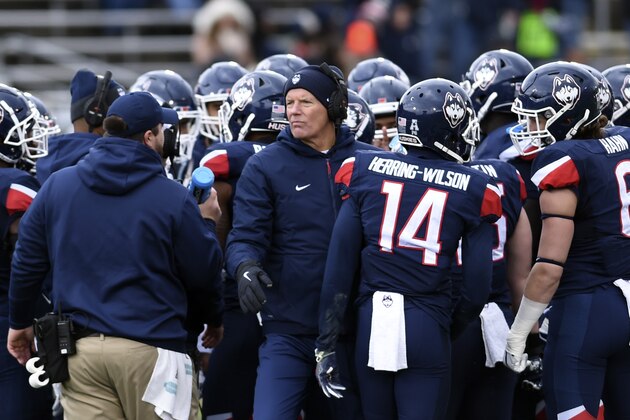 Connecticut head coach Randy Edsall walks out of a huddle during a time out in the second half of an NCAA college football game against SMU Saturday, Nov. 10, 2018, in East Hartford, Conn.(AP Photo/Stephen Dunn)